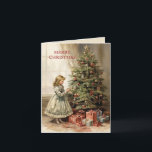 Cartes Pour Fêtes Annuelles Joyeux cadeau de Noël vintage<br><div class="desc">Carte de voeux pliée avec un tableau vintage d'une fille décorant un sapin de Noël avec des cadeaux emballés en dessous. Texte dit, "Joyeux Noël" mais est personnalisable pour votre propre salutation. Personnalisé au dos avec votre message et votre nom. Contactez-moi pour obtenir de l'aide sur votre personnalisation ou pour...</div>