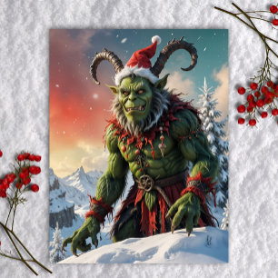 Cartes Pour Fêtes Annuelles Krampus vert sur le sommet enneigé d'une montagne,