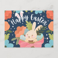 Lapin doux dans un panier-cadeau “Joyeuses Pâques”