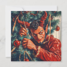 Le diable décore l'arbre de Noël