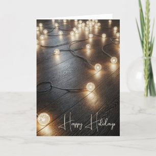Cartes Pour Fêtes Annuelles Lumières de vacances sur le plancher de bois