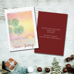 Cartes Pour Fêtes Annuelles Noël Tropical Beach Sunset Palm Trees<br><div class="desc">Carte de voeux de Noël Tropical Beach,  avec palmiers et coucher de soleil image et typographie de script. Avec le lettrage personnalisable,  vous pouvez ajouter vos propres informations. Une façon festive d'envoyer des voeux de vacances à des amis et à la famille des tropiques.</div>