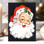 Cartes Pour Fêtes Annuelles Noël vintage au Père Noël<br><div class="desc">Envoyez des voeux nostalgiques de vacances avec cette charmante carte postale de Noël vintage au Père Noël. Avec une illustration classique du visage joyeux de Père Noël avec son emblématique casquette rouge et saint, cette carte postale saisit l'essence de la traditionnelle joie de Noël. Parfait pour répandre la joie festive...</div>