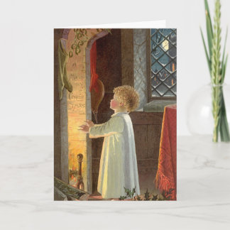 Cartes Pour Fêtes Annuelles Noël vintage, enfant se réchauffant près de la che