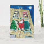 Cartes Pour Fêtes Annuelles père Noël et menorah<br><div class="desc">père Noël livre des cadeaux dans la ville en repoussant côté du bâtiment passé un locataire juif à l'aspect élégant avec menorah dans la fenêtre.</div>