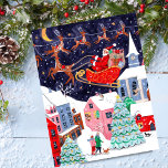 Cartes Pour Fêtes Annuelles Père Noël Nuit avant Noël Village nordique<br><div class="desc">La Nuit avant Noël avec le père Père Noël Noël dans son traîneau et ses rennes Rudolf le Reindeer au-dessus d'un village nordique Noël paysage de la scène de neige de Noël. OEuvre originale de Caroline Bonne Müller</div>