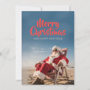Cartes Pour Fêtes Annuelles Père Noël se détendant sur chaise de plage