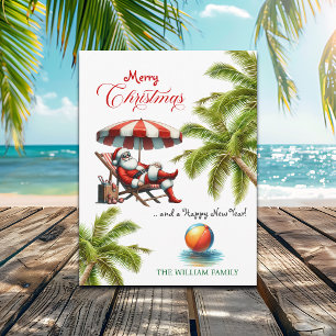 Cartes Pour Fêtes Annuelles Père Noël sous un parasol de plage de Noël
