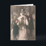 Cartes Pour Fêtes Annuelles Photo de Christmas Girls et Snowman Vintage<br><div class="desc">A charming antique 1910 French Christmas photo postcard of two pretty,  adorable little girls happily hugging and posing with their solive snowman friend,  as snow flow down upon them. Wishing a Joyeux Noel.</div>