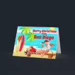 Cartes Pour Fêtes Annuelles San Diego Christmas Père Noël et Surf boards Beach<br><div class="desc">Cette carte de voeux de Noël Joyeux présente Santa Clause sur une plage de San Diego. Il se détend avec ses planches de surf, profite du soleil, des palmiers et de sa pipe. Salutation intérieure ~ "Voeux les plus chauds de notre Paradis des Vacances à votre... ". Tout le texte,...</div>