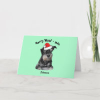Schnauzer noir et argent portant un chapeau de Pèr