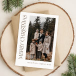 Cartes Pour Fêtes Annuelles Script moderne Vertical Deux Photo Famille Noël<br><div class="desc">Célébrez la saison festive avec une touche d'élégance grâce à cette carte de vacances familiale moderne à deux photos. Avec un design minimaliste et un script vertical élégant, cette carte offre une esthétique boho intemporelle et rustique. Idéal pour exposer des moments de famille, son look chic et contemporain allie simplicité...</div>