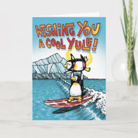Tandem frais de Noël surfant les pingouins