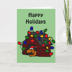 Cartes Pour Fêtes Annuelles Teckel drôle dans le chenil de Noël