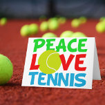 Cartes Pour Fêtes Annuelles Tennis Love<br><div class="desc">J'adore jouer au tennis. Un joli cadeau de Noël de joueur de tennis avec une balle de tennis jaune comme le O in Love. Paix et tennis écrits en bleu et vert.</div>