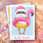 Cartes Pour Fêtes Annuelles Tropical Santa Flamingo Christmas Non-Photo<br><div class="desc">Santa in a hot pink stocking cap, yellow bathing suit and flip flops is in a hot pink flamingo inner tube on these tropical holiday greeting cards. Your greeting on the front and your names and message on the back. Select Matte for heaviest paper and high definition for best print...</div>
