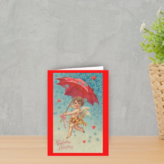 Cartes Pour Fêtes Annuelles Victorian Valentine Cupid Hearts Parapluie (Victorian flying cupid red umbrella harts snowflakes on red Valentine's greeting card.)