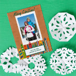 Cartes Pour Fêtes Annuelles Vintage Skis Custom Photo<br><div class="desc">Show off a photo from your ski trip this Christmas with this custom photo holiday card. Add your own greeting and your own from message to this card as well as your portrait shaped photo. Your photo is set in a white frame against a light brown background that mimics the...</div>