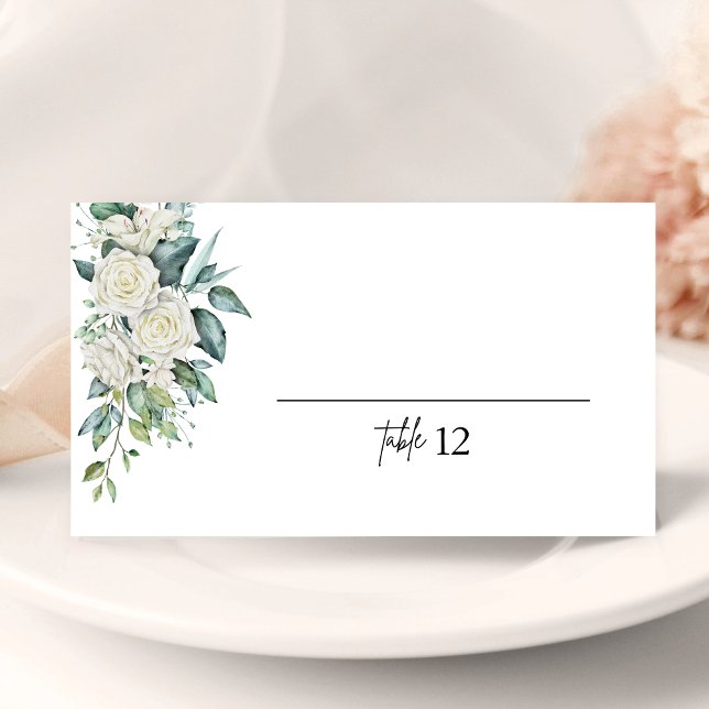 Carton de table plié pour mariage avec feuillage W (White rose greenery folded place card guides guests with elegance and a personal touch.)