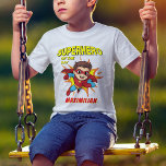 Cartoon Superhero Comic Boy Birthday Party T-shirt<br><div class="desc">Célébrez en style avec notre t-shirt de fête d'anniversaire de bande dessinée super-héros garçon! Avec des couleurs vives et des graphismes pleins d'action, cette chemise est parfaite pour les jeunes héros prêts à sauver la journée. De plus, personnalisez-le avec le nom du récipiendaire pour une touche spéciale supplémentaire qui leur...</div>