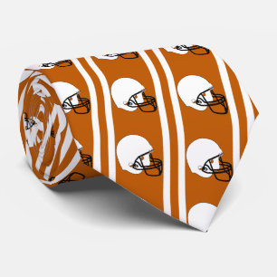 Casque de football blanc sur cravate orange brûlée