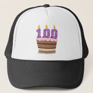 Casquette 100 ans sur le gâteau d'anniversaire