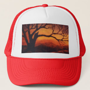 Casquette Arbre mort nu devant le coucher du soleil