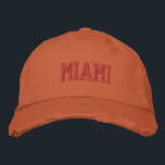 Casquette Brodée MIAMI Rouge et Orange Style Vintage en détresse<br><div class="desc">Casquette orange en coton avec broderie rouge MIAMI de style vintage et aspect usé. Fait un merveilleux cadeau pour quiconque aime Miami FL ! Si vous préférez avoir votre propre texte, sélectionnez simplement le bouton "Personnaliser ce modèle" pour entrer votre choix de texte personnalisé. La broderie est également personnalisable avec...</div>