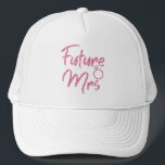 Casquette de camionneur Future Mrs couleur rose<br><div class="desc">Le design Future Mrs rose scintillant est idéal pour une douche de mariée ou une soirée d'enterrement de vie de jeune fille, des fêtes de fiançailles et des séances photo. Le nom de famille peut être facilement modifié. Le lettrage Future Mrs est disponible en 6 couleurs vibrantes et luxueuses pour...</div>