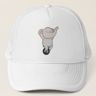Casquette Eléphant comme artiste au cirque avec pneus