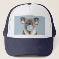 Koala souffle une gomme à bulle bleue