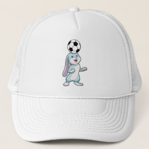 Casquette Lapin comme joueur de football avec balle de footb