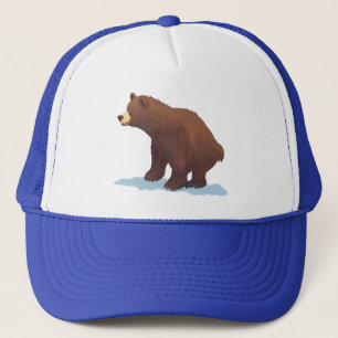 Casquette ours Brown marchant sur la neige