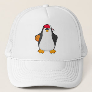 Casquette Penguin comme joueur de basket-ball avec basket-ba