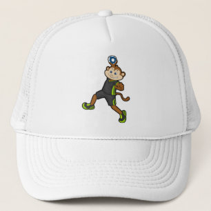 Casquette Singe chez le handballeur avec ballon de handball