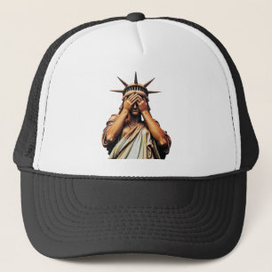Casquette Statue de la Liberté se couvrant le visage de hont