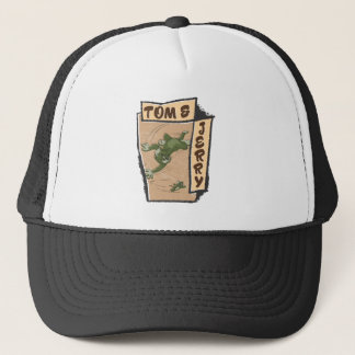 Casquette Tom et Jerry sur un canapé tan