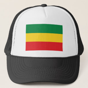 Casquette Vert, or (jaune) et drapeau de couleurs rouges