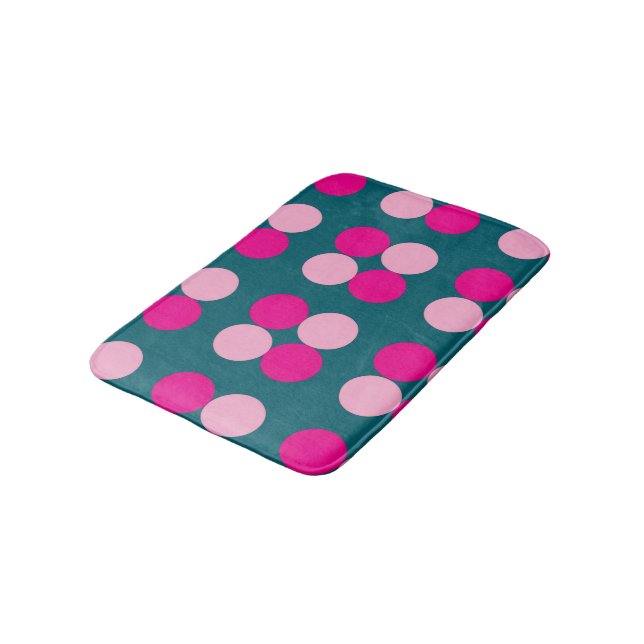 Cercles roses sur tapis de bain vert (Angle)