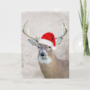 Cerf de Noël avec carte de vacances de Santa Hat