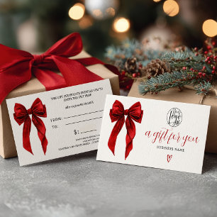 Certificat cadeau de Noël avec nœud coquet rouge