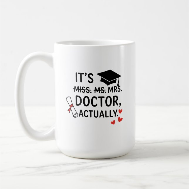 C'est Docteur en fait Graduation Mug (Gauche)