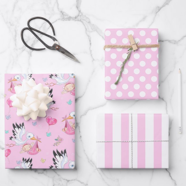 C'est un papier cadeau bébé fille cigogne (Recto)