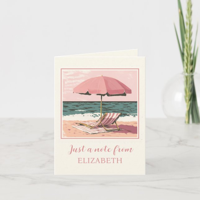 Chaise de plage rose et crème et parapluie (Devant)