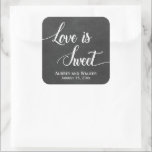 Chalkboard Love is Sweet Wedding Favor Stickers<br><div class="desc">Des autocollants tendance et mignon pour le mariage avec un joli design de texte de typographie blanche qui dit l'amour est doux sur un arrière - plan de tableau noir faux. Personnalisé ces étiquettes cool avec le nom de la mariée et du marié et la date du mariage.</div>
