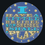 Chanukah Stickers "Dreidel Play/Gold, Blue" rond<br><div class="desc">Chanukah/Hanoukka "J'Ai Un Petit Dreidel Maintenant Dreidel Je Jouerai/Or, Bleu" Stickers Tour. Amusez-vous à utiliser ces autocollants comme garnitures de gâteau, préférez les fermetures de sacs, ou n'importe quel rocher vos festivités! L'arrière - plan peut être changé en choisissant parmi une grande sélection de couleurs. Merci de vous être arrêté...</div>