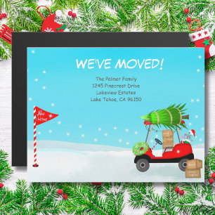 Chariot de golf de Noël avec cartons de déménageme