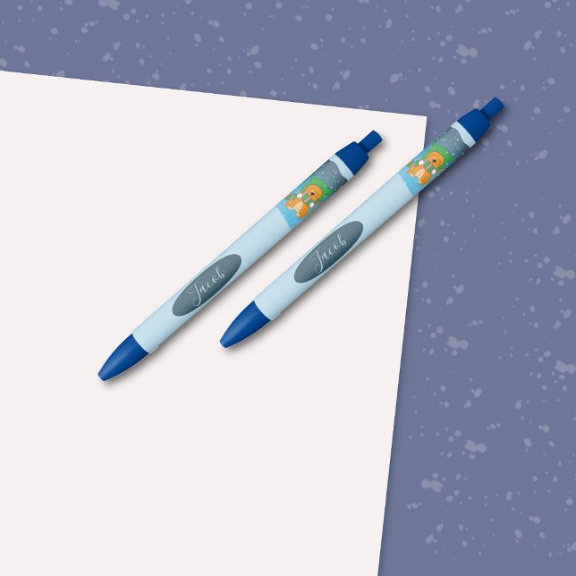 Chat au gingembre en dessin dans le stylo à neige  (Cartoon ginger cat pens with name . )