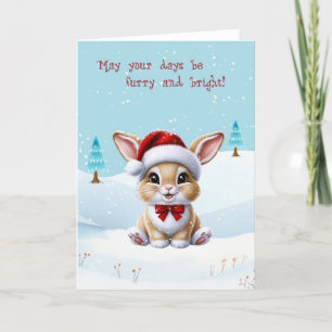 Chat blanc mignon dans la carte de Noël neige
