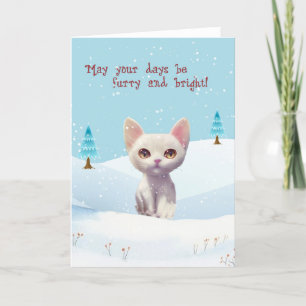 Chat blanc mignon dans la carte de Noël neige